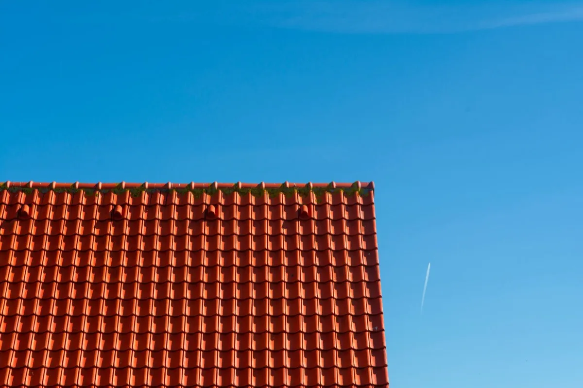 Tile roof gable in full sun, the kind of exposure that sets roof life in Lynchburg, VA